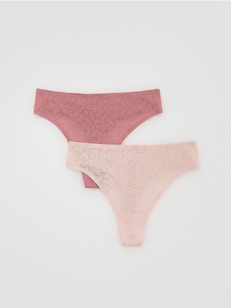 Majtki typu stringi 2 pack - pastelowy róż. Czerwone stringi Reserved, bez wzorów. W wyprzedaży za 22.99 zł.