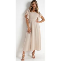 Beżowa Rozkloszowana Sukienka Zdobiona Falbanami Emilienne. Brązowe sukienki damskie Born2be, z aplikacjami, z jeansu, eleganckie, bez ramiączek. Za 229.99 zł.