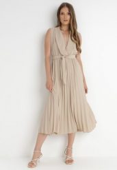 Beżowa Sukienka Ymir. Brązowe sukienki damskie Born2be, bez wzorów, z materiału, eleganckie, bez ramiączek. Za 89.99 zł.