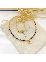 Atelier MIU Pozłacany naszyjnik z elementem ozdobnym - dł. 38 cm rozmiar: onesize. Czarne naszyjniki damskie atelier MIU, z perłą, pozłacane. Za 30.99 zł.