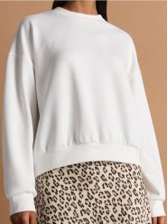 Gładka bluza z długim rękawem soft touch - kremowy. Białe bluzy damskie Sinsay, l, bez wzorów, bez kaptura. Za 49.99 zł.