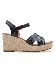 Clarks Skórzane sandały "Sabina Strap" w kolorze czarnym na koturnie rozmiar: 40. Czarne sandały damskie Clarks, bez wzorów, z otwartym noskiem, bez obcasa, na koturnie, bez zapięcia. Za 217.99 zł.