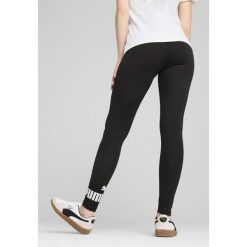 Legginsy damskie z logo No. 1 ESS PUMA Black. Czarne legginsy damskie Puma, l, bez wzorów, z dżerseju. W wyprzedaży za 94.00 zł.