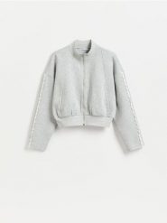 Bluza z ażurowymi wstawkami - jasnoszary. Szare bluzy damskie Reserved, l, w ażurowe wzory, z bawełny, bez kaptura. Za 99.99 zł.