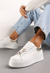 Biało-Złote Sneakersy z Cyrkoniami na Sznurówkach z Platformą Nomiji. Białe obuwie sportowe damskie Renee, z jeansu, bez zapięcia. Za 79.99 zł.