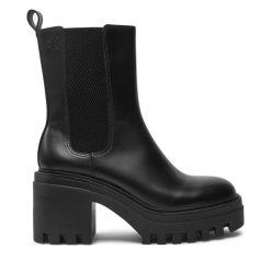 Botki Calvin Klein Jeans. Czarne botki damskie Calvin Klein Jeans, z jeansu, bez obcasa, na słupku, bez zapięcia. Za 479.99 zł.