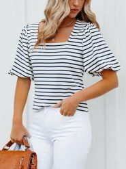 Milan Kiss Bluzka w kolorze białym rozmiar: L. Białe bluzki damskie Milan Kiss, l, bez wzorów, bez kołnierzyka, bez ramiączek. Za 126.99 zł.