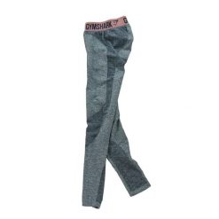 Second life - Damskie legginsy w kolorze granatowym - Stan bardzo dobry. Niebieskie legginsy damskie Gymshark, bez wzorów. Za 101.48 zł.