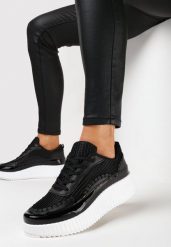 Czarne Sneakersy z Patchworkową Cholewką i Tłoczoną Platformą Geridia. Czarne obuwie sportowe damskie Born2be, bez zapięcia. Za 84.99 zł.