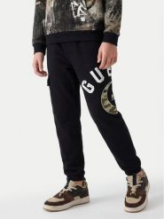 Guess Spodnie dresowe L6YB01 K4083 Czarny Regular Fit. Czarne spodnie dresowe chłopięce Guess, z bawełny. Za 214.99 zł.