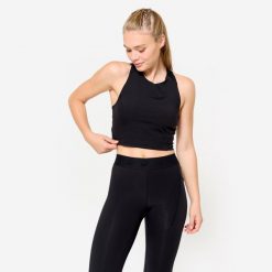 Koszulka fitness damska Domyos crop top bez rękawów. Czarne koszulki sportowe damskie DOMYOS, l, bez wzorów, z elastanu, bez ramiączek, na fitness i siłownię. Za 69.99 zł.