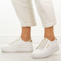 Białe trampki damskie Lee Cooper 4478. Białe trampki damskie Lee Cooper, bez wzorów, z gumy, bez zapięcia. Za 139.00 zł.
