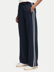 Guess Spodnie dresowe V6YB08 K4286 Granatowy Regular Fit. Niebieskie spodnie dresowe damskie Guess, xs, z aplikacjami, z dresówki. Za 434.99 zł.