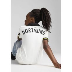 Młodzieżowa koszulka dodatkowa Borussia Dortmund 24/25 PUMA White. Biała bluzki damskie Puma, m, bez wzorów, bez kołnierzyka, bez ramiączek. Za 359.00 zł.
