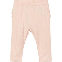 Spodnie "Deisse" w kolorze brzoskwiniowym. Czerwone spodnie materiałowe dziewczęce name it girls, z bawełny. W wyprzedaży za 29.95 zł.