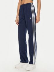 Adidas Spodnie dresowe adicolor Classics Firebird JC8285 Granatowy Regular Fit. Niebieskie spodnie dresowe damskie Adidas, xs, bez wzorów, z dresówki. Za 219.99 zł.