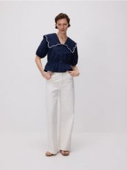 Jeansy wide leg ze średnim stanem - biały. Białe jeansy damskie Reserved. Za 199.99 zł.