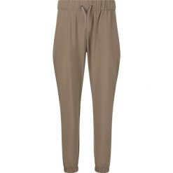 Damskie spodnie dresowe Athlecia Austberg. Brązowe spodnie dresowe damskie Endurance, bez wzorów, z dresówki. Za 193.50 zł.