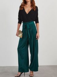 Milan Kiss Spodnie w kolorze morskim rozmiar: XL. Niebieskie spodnie materiałowe damskie Milan Kiss, bez wzorów, z materiału. Za 152.99 zł.