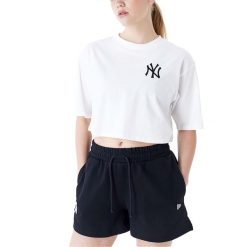 Nowa Koszulka Mlb Le Crop Tee Neyyan Whiblk Damskie. Białe bluzki damskie New Era, m, bez wzorów, z bawełny, bez kołnierzyka, bez ramiączek. Za 275.00 zł.