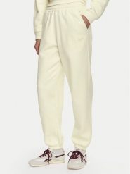 Reebok Spodnie dresowe Reebok x Ewa Chodakowska RK25981CCW Kremowy Regular Fit. Białe spodnie dresowe damskie Reebok, xl, bez wzorów, z bawełny. Za 179.99 zł.