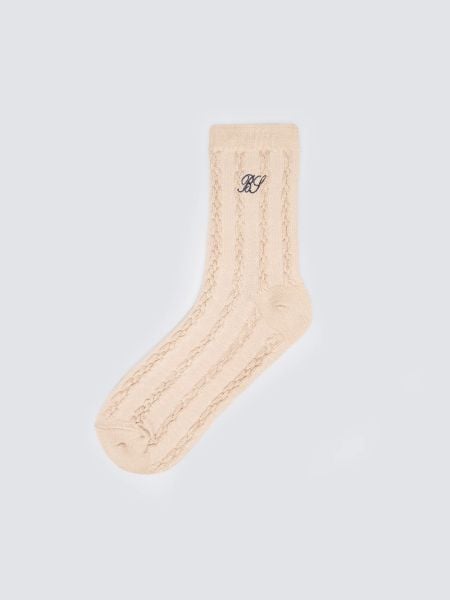 Skarpety damskie z wiskozą z warkoczowym splotem beżowe Brajda 801. Brązowe skarpetki damskie Big Star, bez wzorów, z bawełny. Za 19.99 zł.