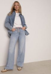 Niebieskie Szerokie Jeansy z Bawełną Wysokim Stanem i Paskiem Typu Sznurek Nevinias. Niebieskie jeansy damskie Born2be, z podwyższonym stanem. Za 119.99 zł.