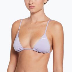 Góra od stroju pływackiego Nike Essential Triangle Bikini. Niebieskie bikini Nike, bez wzorów. Za 99.99 zł.