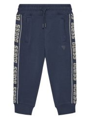 Guess Spodnie dresowe L2YQ48 K6ZS1 Granatowy Regular Fit. Niebieskie spodnie dresowe chłopięce Guess, z bawełny. Za 229.99 zł.