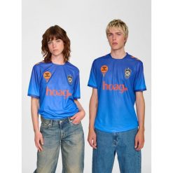 Koszulka domowa Hummel Orange County 2025/26. Białe koszulki damskie Hummel, bez wzorów, bez kołnierzyka, bez ramiączek. Za 340.00 zł.