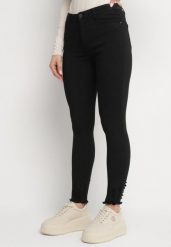 Czarne Jeansy z Wiskozą o Kroju Skinny z Przetarciami Taledis. Czarne jeansy damskie Born2be, bez wzorów, z jeansu. Za 79.99 zł.