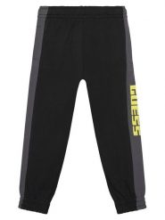 Guess Spodnie dresowe N6RB01 KA6R4 Czarny Regular Fit. Czarne spodnie dresowe chłopięce Guess, z bawełny. Za 159.99 zł.