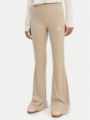 Adidas Legginsy Essentials KD3850 Beżowy Flared Leg. Brązowe legginsy damskie Adidas, xs, bez wzorów, z bawełny. Za 219.99 zł.