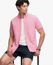 Superdry Koszula Preppy Oxford krótki rękaw z bawełny organicznej. Brązowe koszule damskie Superdry, s, bez wzorów, z bawełny, bez kołnierzyka, bez ramiączek. Za 272.80 zł.