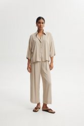 SPODNIE ZORA PIASKOWE XL - Flawless. Spodnie materiałowe damskie Flawless, bez wzorów, z gumy. Za 389.00 zł.