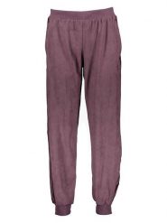 Adidas Spodnie dresowe w kolorze fioletowym rozmiar: 34. Różowe spodnie dresowe damskie Adidas, bez wzorów, z dresówki. Za 110.04 zł.