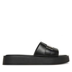 Klapki Calvin Klein. Czarne klapki damskie Calvin Klein, bez wzorów, bez obcasa, bez zapięcia. Za 329.99 zł.