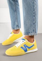 Żółte Sneakersy w Stylu Kultowych Tenisówek z Ozdobnymi Przeszyciami Elanicia. Żółte obuwie sportowe damskie Born2be, bez zapięcia, tenisowe. Za 84.99 zł.
