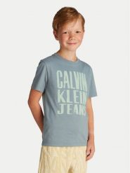 Calvin Klein Jeans T-Shirt Slogan Graphic IB0IB02459 Niebieski Regular Fit. Niebieskie t-shirty i koszulki chłopięce Calvin Klein Jeans, bez wzorów, z bawełny, bez kołnierzyka, bez ramiączek. Za 89.99 zł.