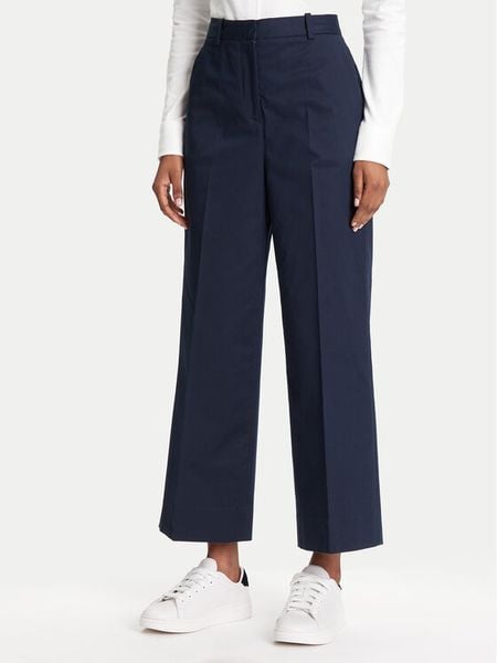 Tommy Hilfiger Spodnie materiałowe WW0WW45791 Granatowy Wide Leg. Niebieskie spodnie materiałowe damskie Tommy Hilfiger, bez wzorów, z bawełny. Za 339.99 zł.