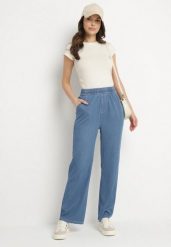 Niebieskie Szerokie Spodnie z Wiskozą Bawełną Wysokim Stanem Imitujące Jeans Caldexis. Niebieskie spodnie materiałowe damskie Born2be, bez wzorów, z bawełny. Za 79.99 zł.
