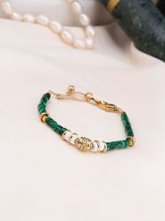 Charlize Pozłacana bransoletka z malachitami rozmiar: onesize. Zielone bransoletki damskie Charlize, pozłacane. Za 73.93 zł.