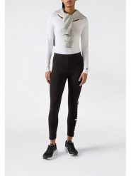Champion Legginsy w kolorze czarnym rozmiar: XL. Czarne legginsy damskie Champion, xl, bez wzorów. Za 87.81 zł.