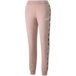 Spodnie damskie Puma Power Tape FL. Czerwone spodnie dresowe damskie Puma, l, bez wzorów. Za 148.99 zł.