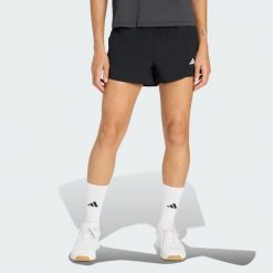 Szorty do ćwiczeń Essentials 2in1. Białe spodenki sportowe damskie Adidas, na lato, l, bez wzorów, z elastanu, z standardowym stanem, na fitness i siłownię, climacool (adidas). Za 179.00 zł.