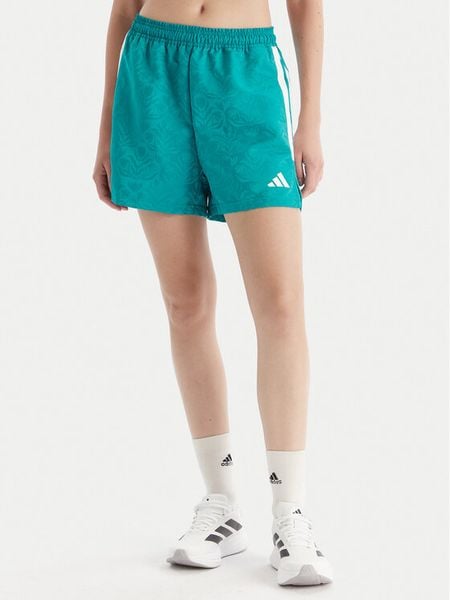 Adidas Szorty sportowe Tiro x Common Goal JL9208 Turkusowy Loose Fit. Niebieskie spodenki sportowe damskie Adidas, s, bez wzorów, z syntetyku. Za 139.99 zł.