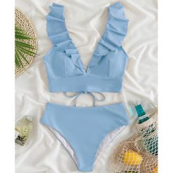 Dwuczęściowy strój kąpielowy z falbankami i wysoką talią Iolanthe. Niebieskie bikini Intica, bez wzorów, z materiału. Za 149.00 zł.