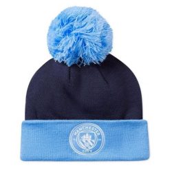 Puma Czapka Mcfc Ess Pom Pom 02561303. Niebieskie czapki damskie Puma, bez wzorów. Za 83.99 zł.