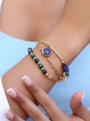 Pierres de Jade Pozłacana bransoletka z elementami ozdobnymi rozmiar: onesize. Niebieskie bransoletki damskie Pierres de Jade, pozłacane. Za 43.99 zł.