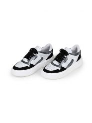 Anna Morellini Skórzane sneakersy "Ludia" w kolorze biało-czarnym rozmiar: 39. Białe obuwie sportowe damskie Anna Morellini, bez zapięcia. Za 351.38 zł.